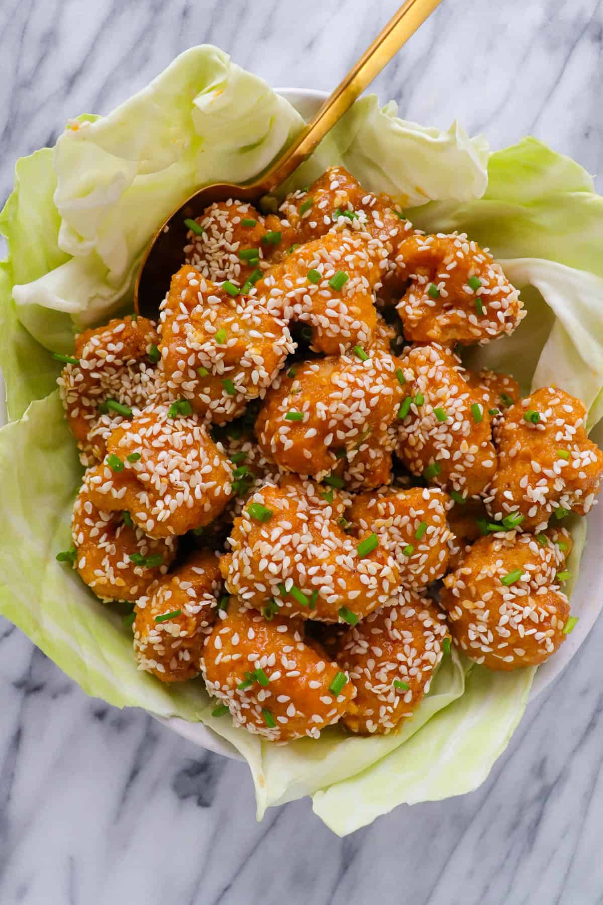 Orange sesame cauliflower in a bowl.