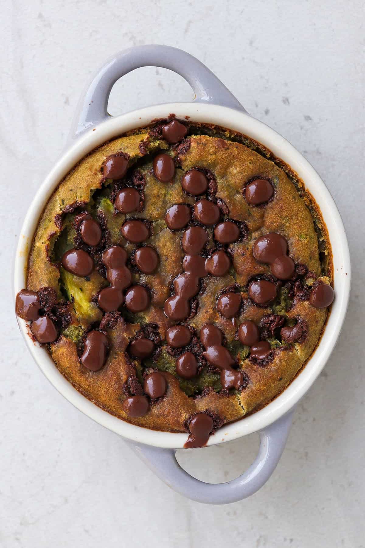 Baked oats in remain with melted chocolate chips.