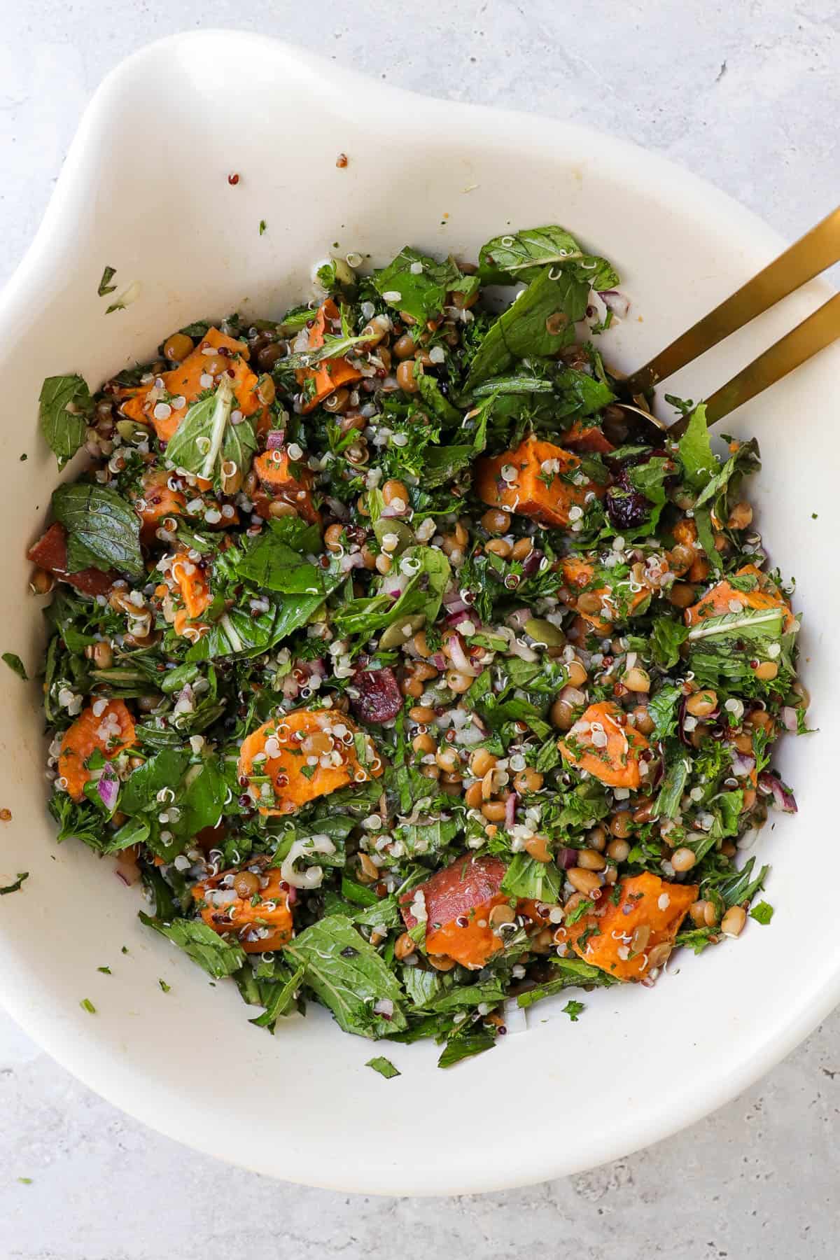 Salad in mixing bowl.