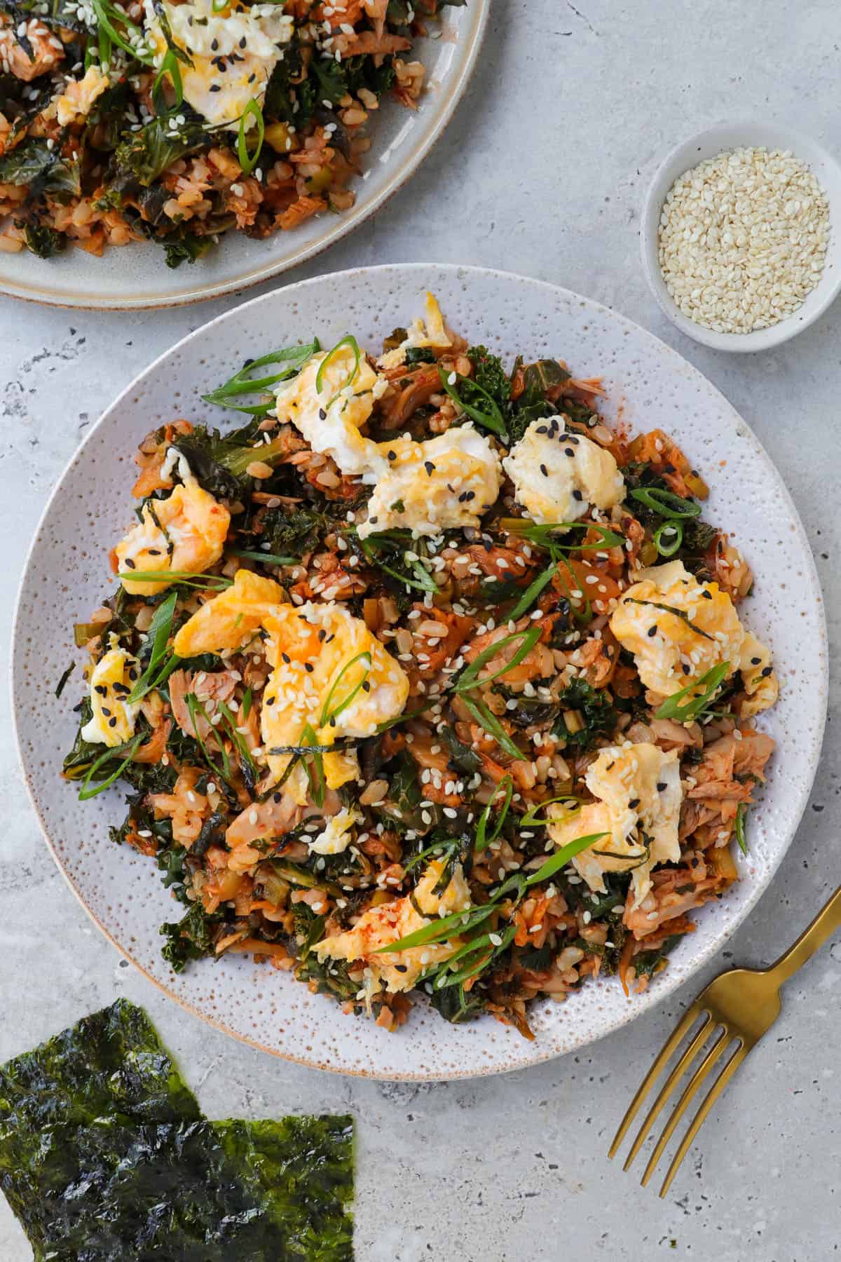 Kimchi fried rice on plate with fork.