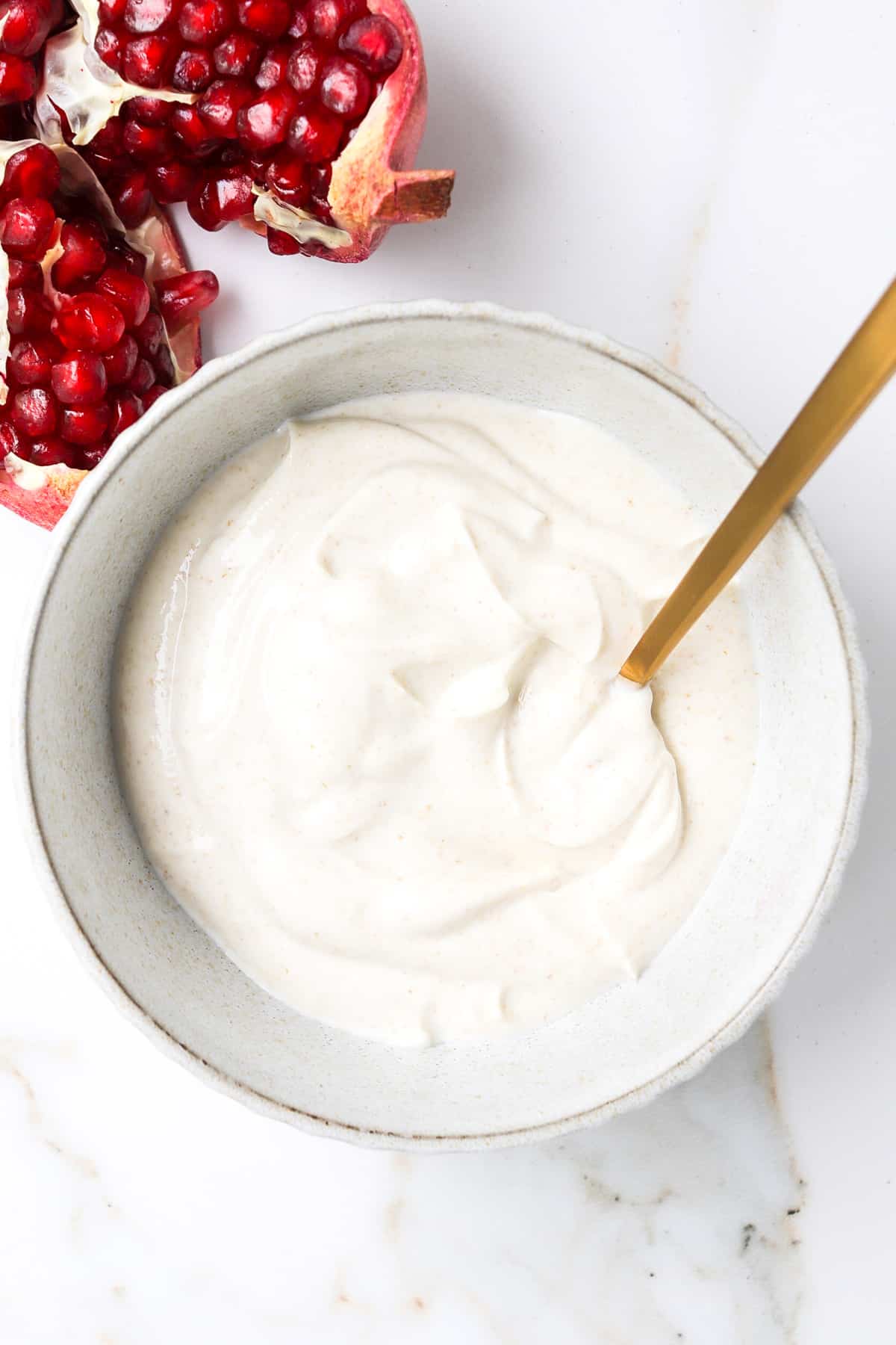 Honey yoghurt dressing in a bowl.