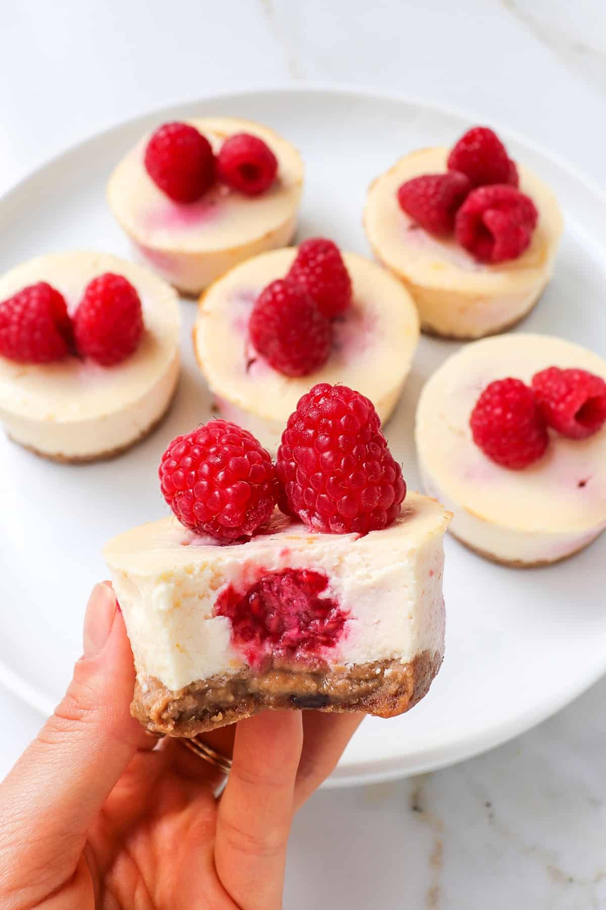 Close up bite shot of a cheesecakes in my hand.