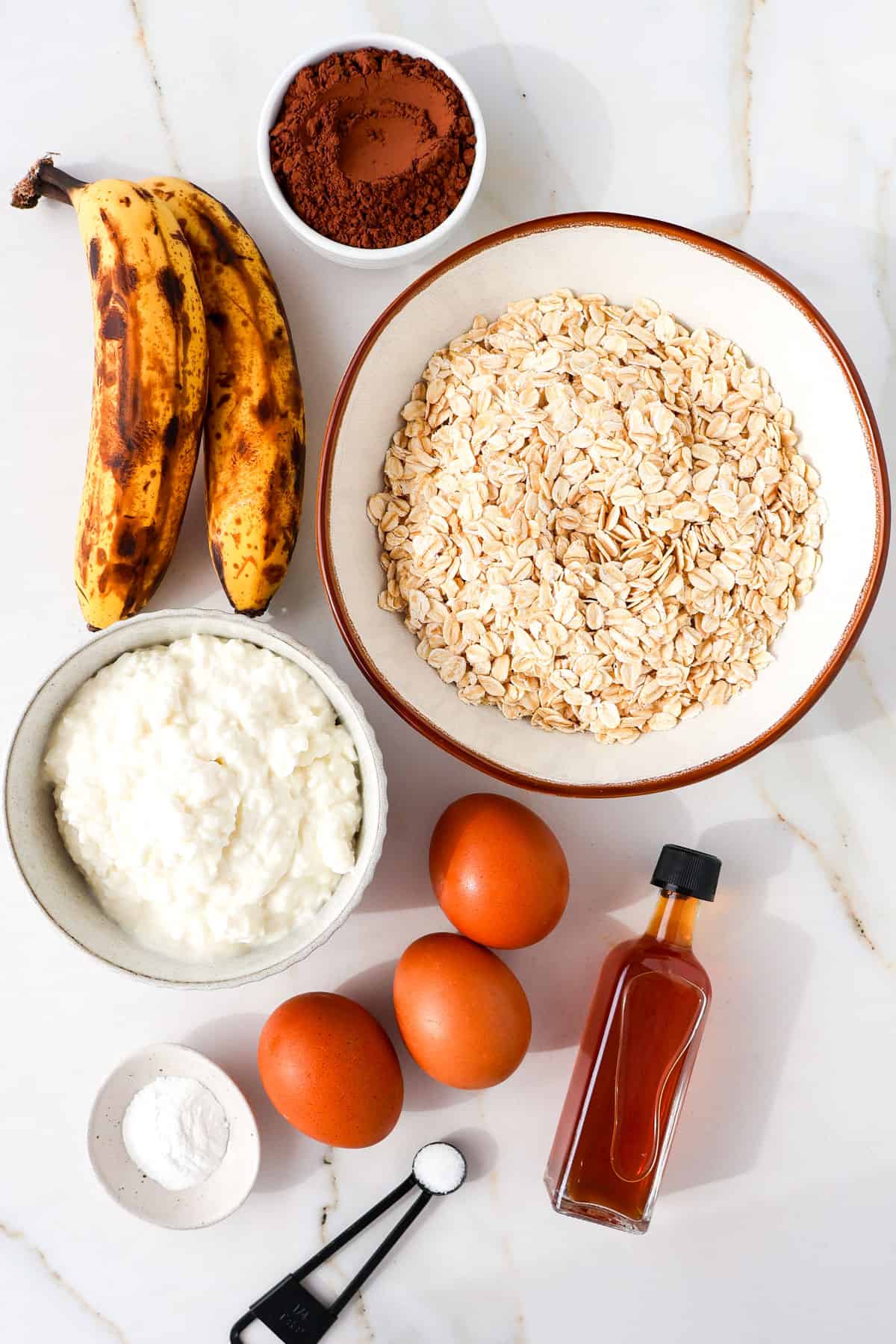 Ingredients shown to make chocolate protein pancakes.
