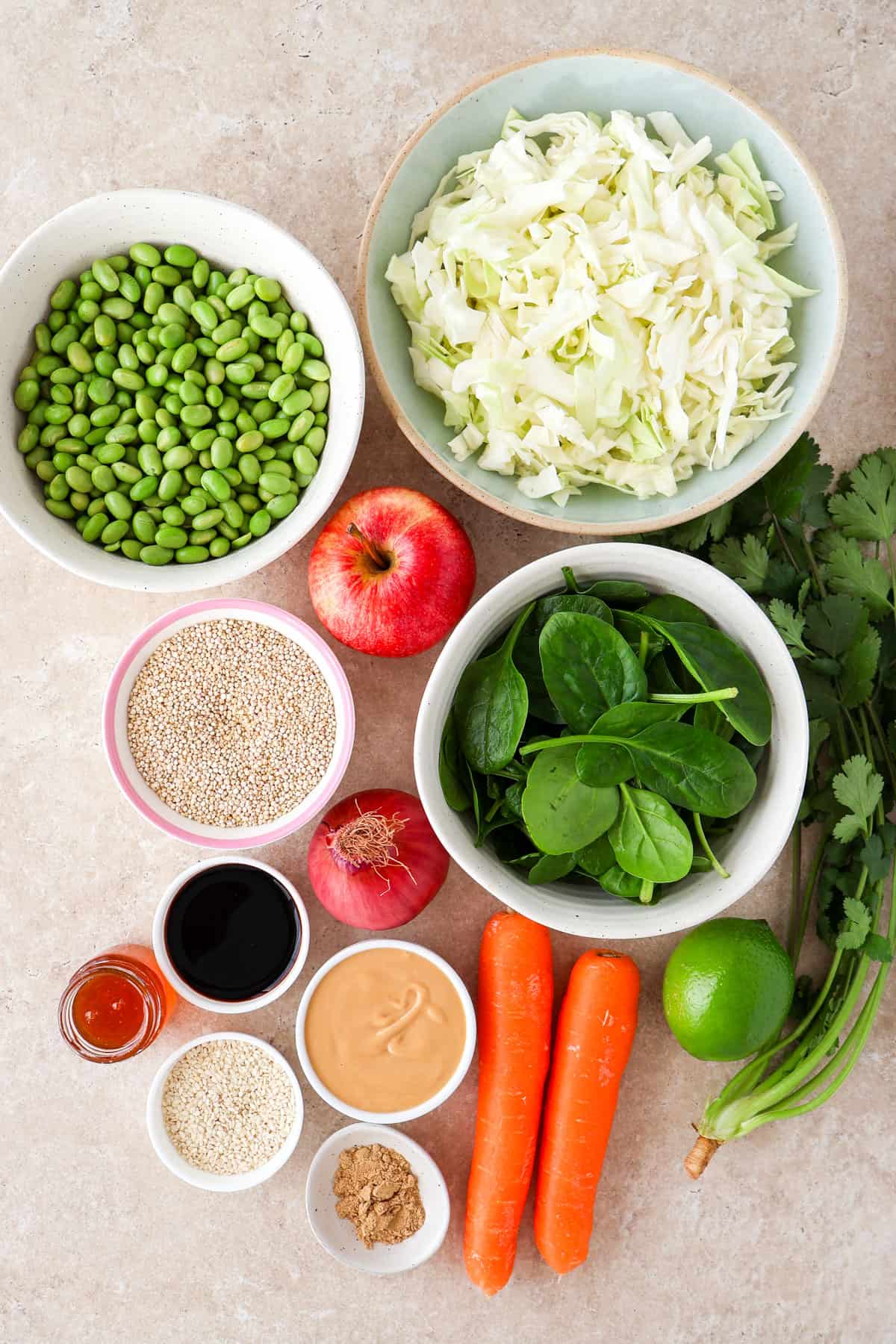 Ingredients shown to make quinoa edamame salad.
