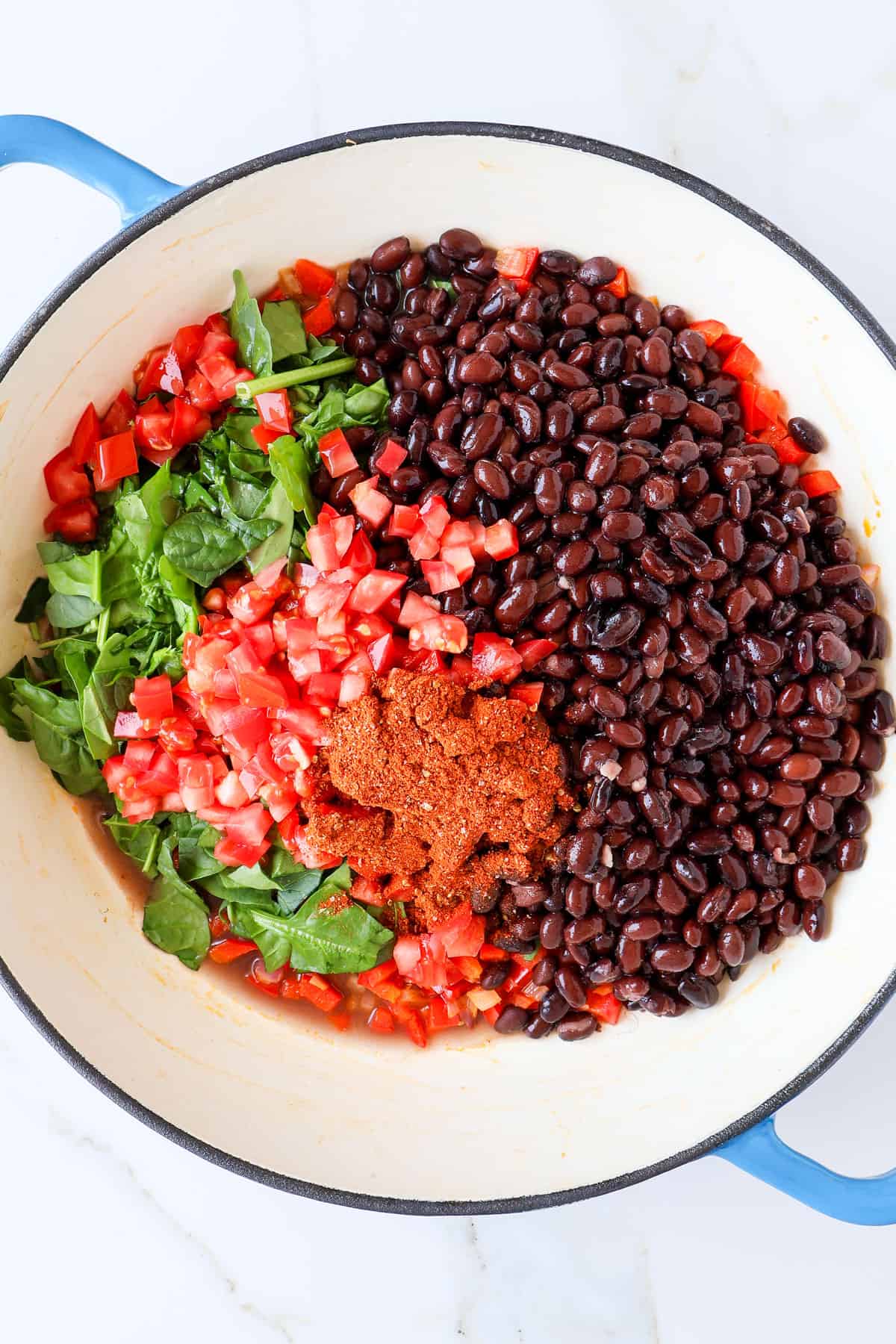 Black bean filling cooked in a pan.
