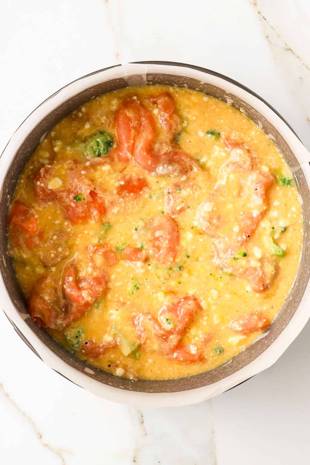 Egg mixture poured on top.