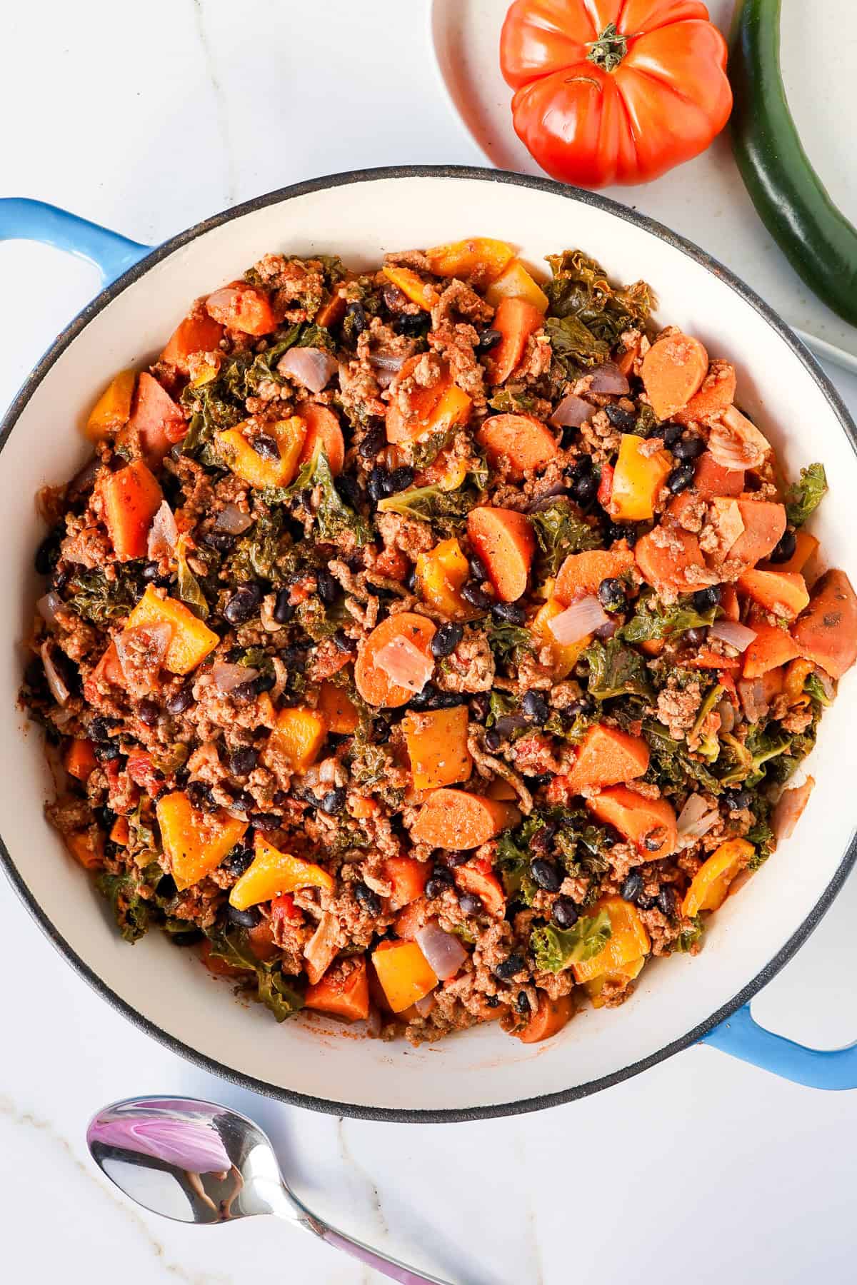 Beef skillet with a spoon at the bottom.