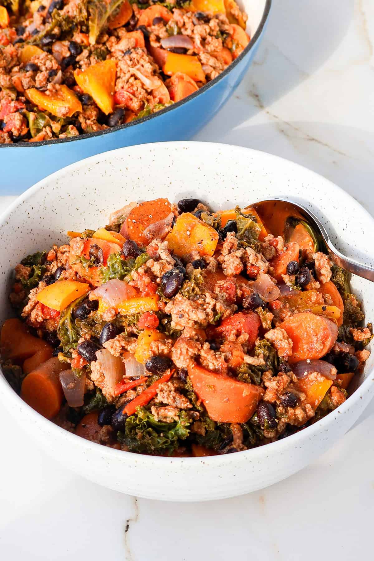 Ground beef and sweet potato skillet served in a bowl.