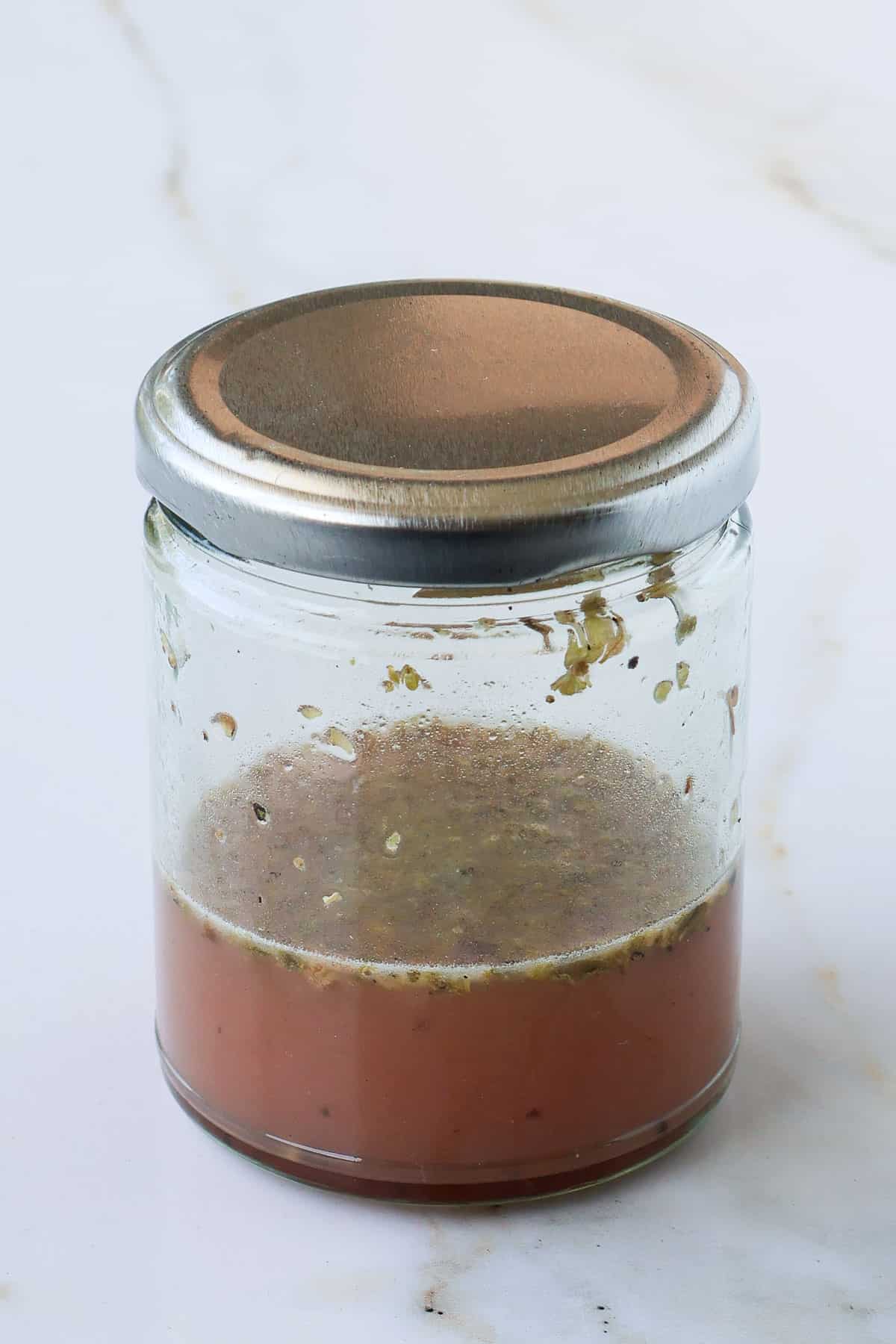 Lemon dressing in a jar.