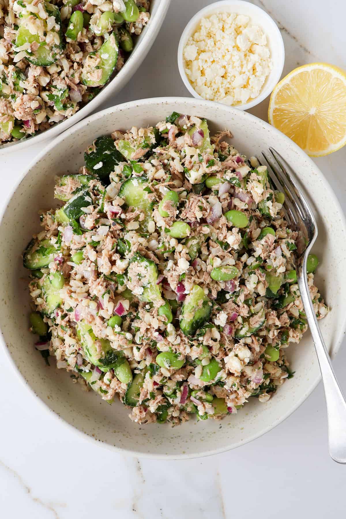 Tuna salad in a serving bowl with a fork.