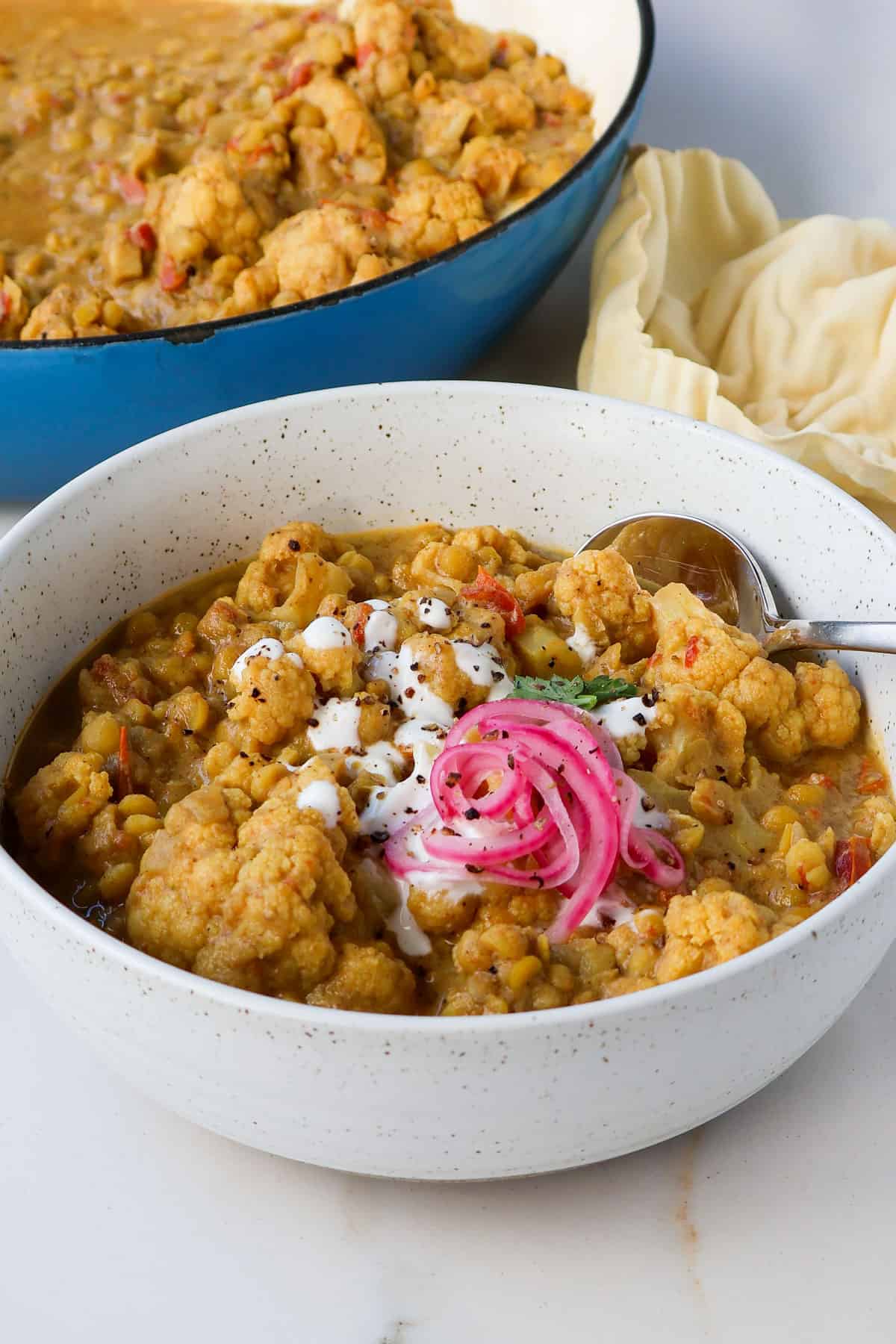 Side shot of curry in a bowl.